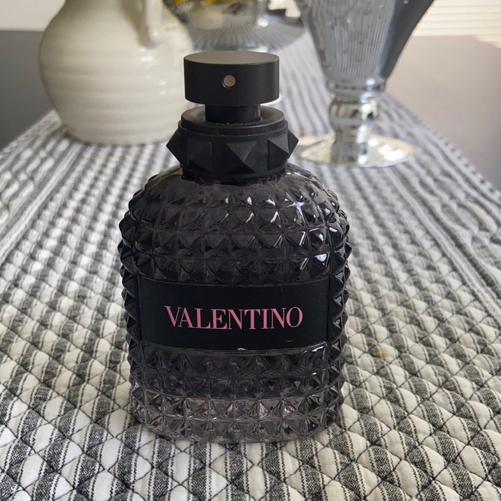 Empty Valentino perfume bottle